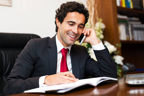 Portrait of a lawyer talking on the phone stock photo