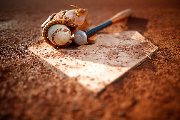 Baseball game Baseball and glove Bat at Home Plate home plate stock pictures, royalty-free photos & images