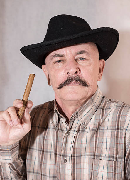 istock The cowboy with mustache, in a black hat 522482910
