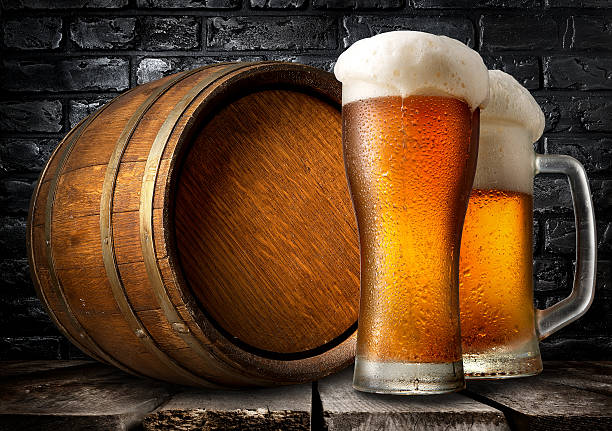 istock Beer and wooden keg 522484624