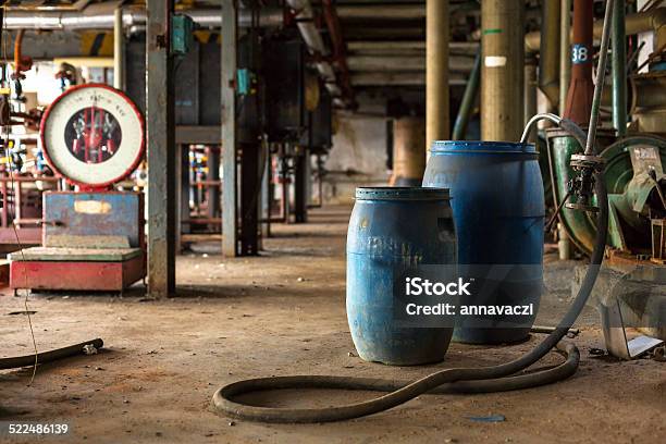 Industrial Interior With Chemical Tanks Stock Photo - Download Image Now - Large, Plastic, Abandoned