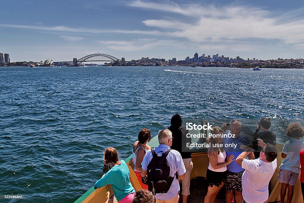 Passengers enjoy the Manly  ferry Sydney,Australia - October 19,2014: Passengers enjoy the ride from Manly to Circular Quay. The 7 mile journey takes them from the ocean to the heart of Sydney. Australia Stock Photo