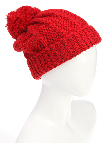 Pom Pom Red Beanie with Mannequin head on a white background