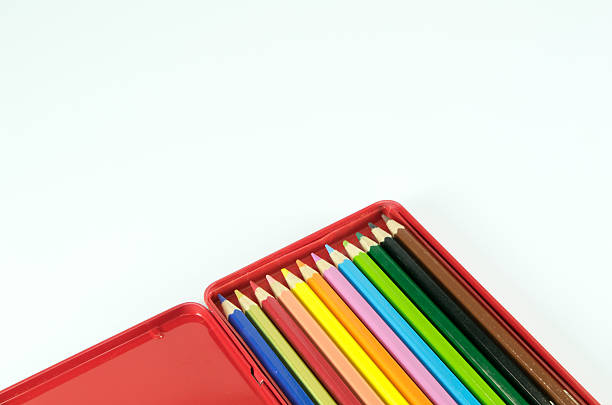 istock Pencil in red metal box isolated on white background 522487909