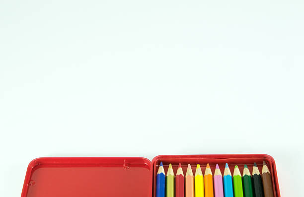istock Pencil in red metal box isolated on white background 522487911