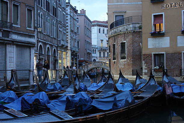 istock Traditional Venice gondola parked in the water 522489667