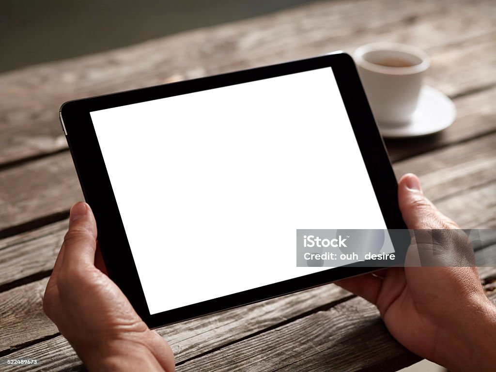 Uomo utilizzando computer tablet digitale - Foto stock royalty-free di Adulto