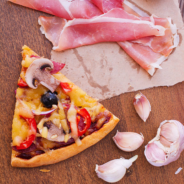 istock Pizza with tomato, salami and olives 522489907