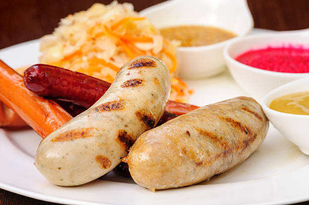 istock German sausage with cabbage and sauces 522490327