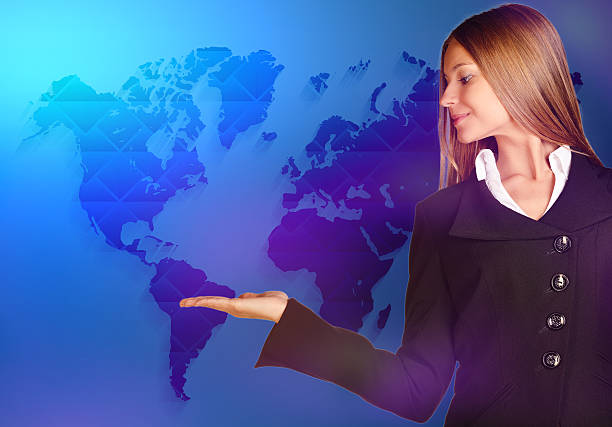 istock business woman looking at the empty hand on world map 522509413