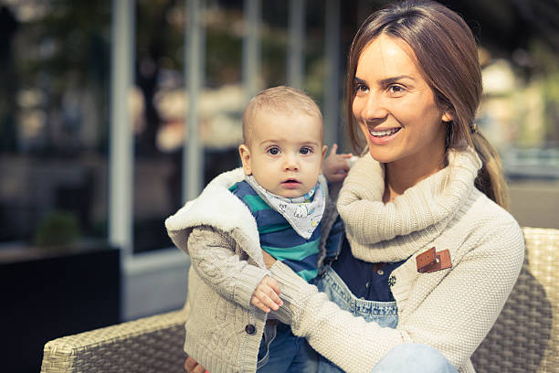 istock Adorable Baby With His Beautiful Mother 522510611