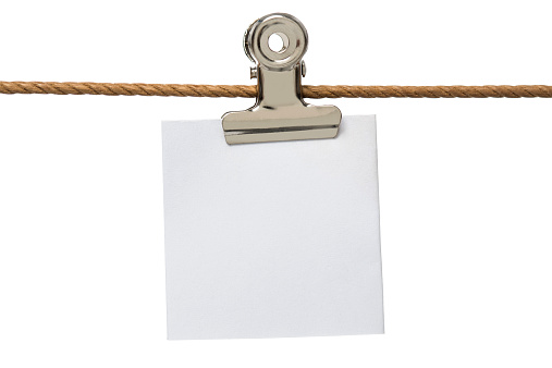 Rope and notepad  isolated on white.