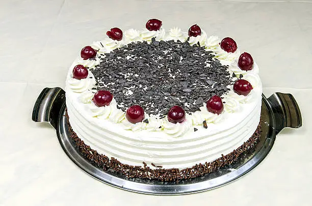 Photo of Cream cake with cherries