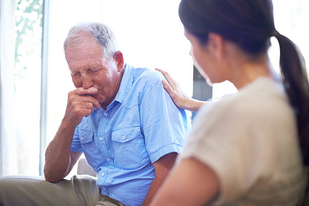 Coming to grips with loss A devastated senior man dealing with some terrible news nursing home photos stock pictures, royalty-free photos & images