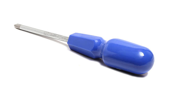 forte cacciavite con impugnatura blu - screwdriver isolated phillips work tool foto e immagini stock