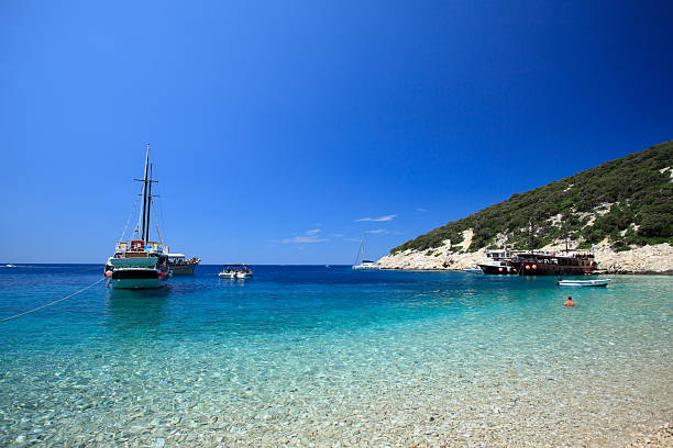 istock Tourist boat at the idyllic bay 522514847