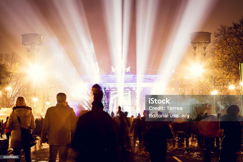 25 years fall of the Wall at "Brandenburger Tor". Berlin, Germany - November 9, 2014: 25 years fall of the Wall : Hundreds of thousands celebrate in Berlin Illuminated Stock Photo