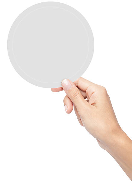 istock woman holding white blank banner 522519639