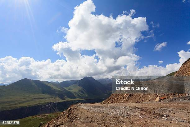 Building Roads In The Mountains Stock Photo - Download Image Now - Agricultural Field, Backgrounds, Cloud - Sky