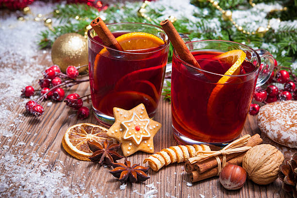 Mulled wine Two glasses of  mulled wine with christmas decoration mulled wine photos stock pictures, royalty-free photos & images