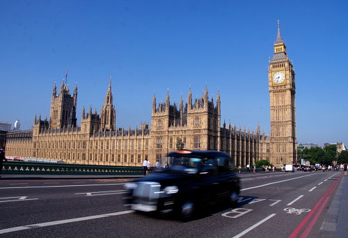 London,England - July 22, 2014 : The black cab is one of the most popular modes of transport around London, England