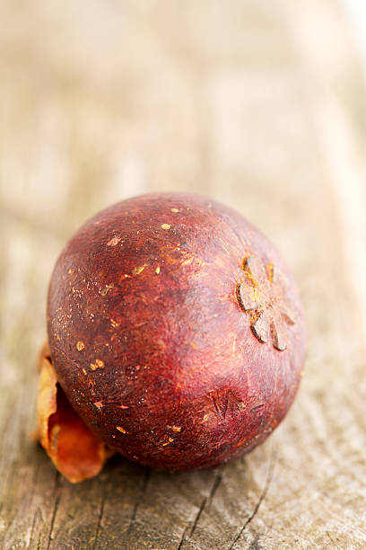 istock Tropical fruits on wooden table slose up 522525493