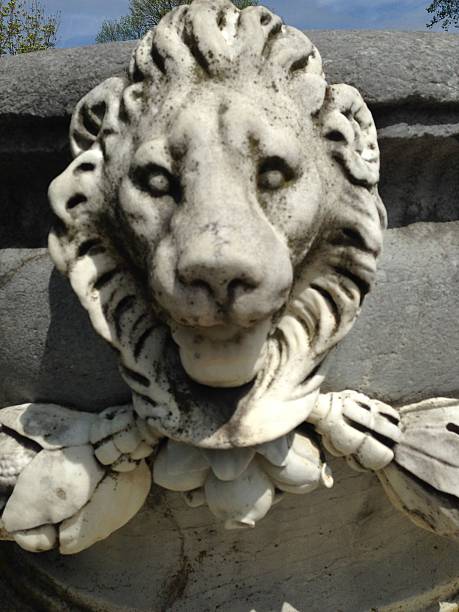 istock Stone Lion Detail on an Urn. 522528360
