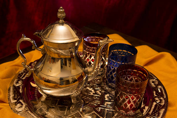 istock Moroccan Teapot with colored glasses on a Copper tray 522528648