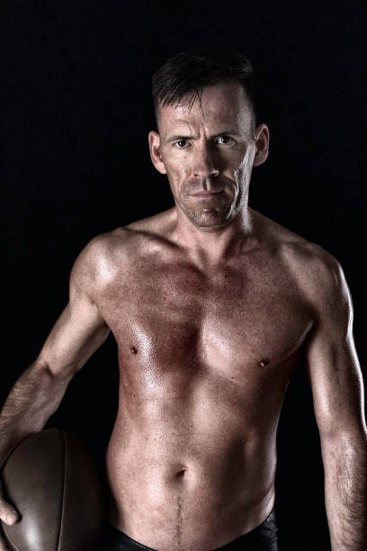istock Sweaty And Tough Man With A Rugger Ball 522529578