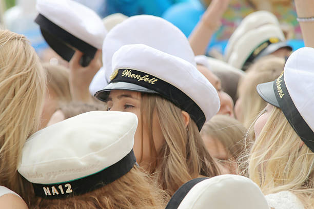 happy teenage girls with wearing graduation cap celebrating the - studenter sweden bildbanksfoton och bilder