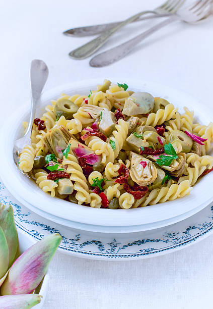 Artichoke and Sun-Dried Tomato Pasta Salad stock photo