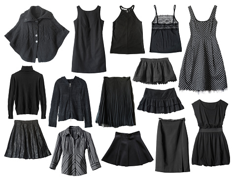 Set of black female clothes isolated over white