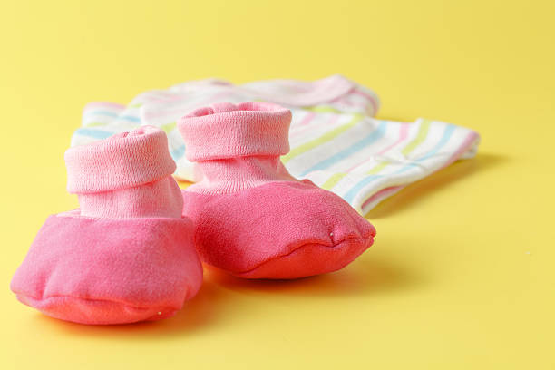 istock Baby clothing on a plain bright background 522534680