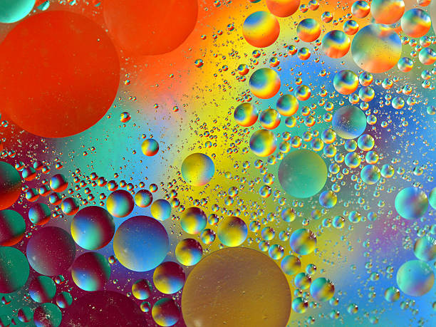 istock Rainbow Colored Oil on Water Circles/Spheres 522537388