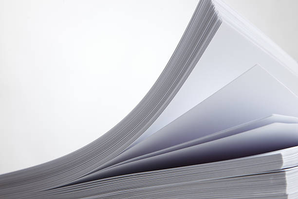 istock Sheets of  printer paper  on white background. 522538727