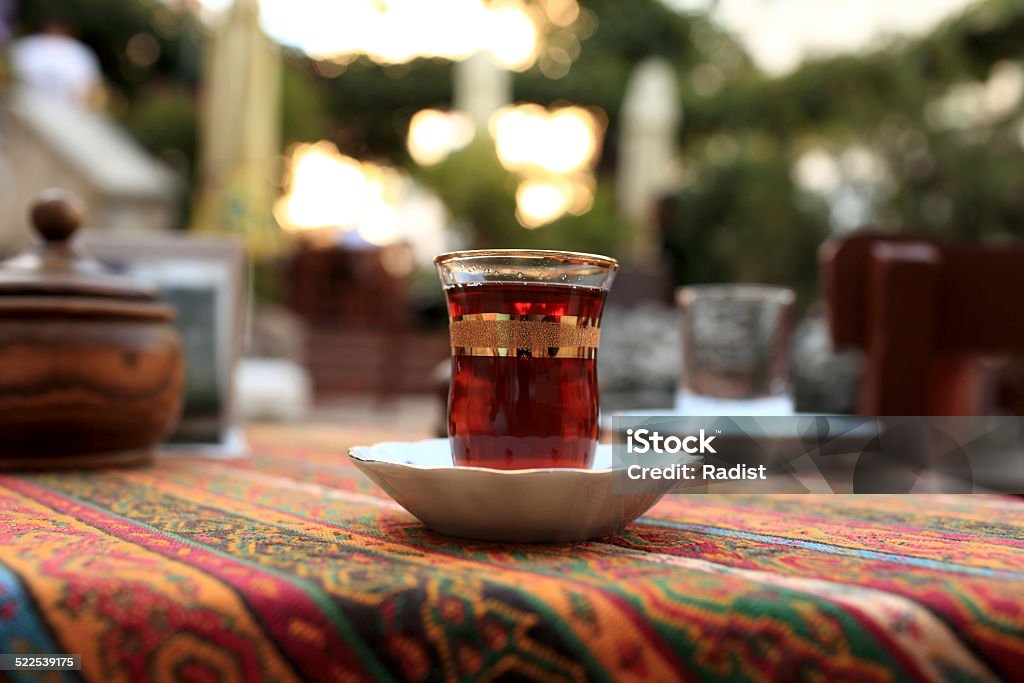 Turkish cup of tea Turkish cup of tea on a table Arabic Style Stock Photo