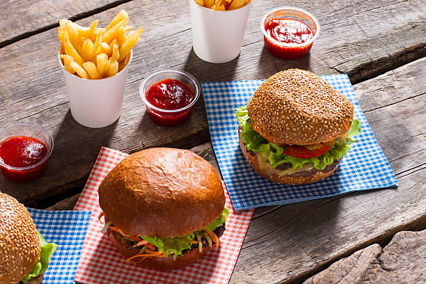 istock Burgers and fries with sauce. 522539236