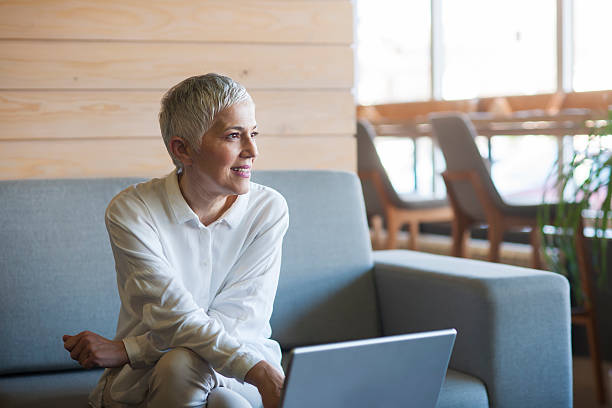 istock Woman working on laptop at cafe 522539844
