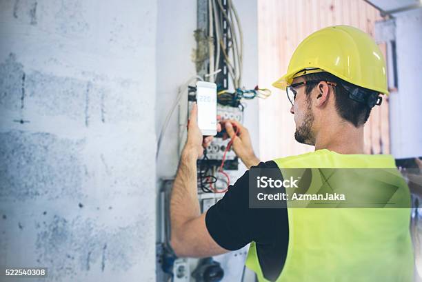 Electrician Stock Photo - Download Image Now - Electricity, Electrician, Power Line