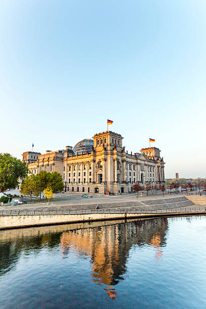 istock reichstag (bundestag) with reflection in spree river in berlin 522540943