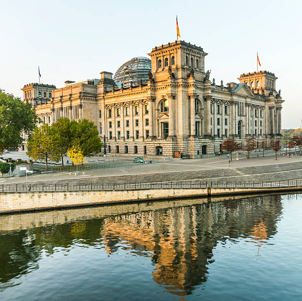 istock reichstag (bundestag) with reflection in spree river in berlin 522540973