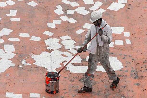 istock Young Seaman Painting His Ship 522541708