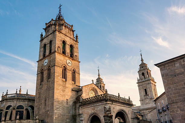 Three bell towers of Lugo cathedral on the evening