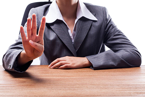 istock Businesswoman Counting Four 522543059