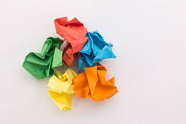 istock crumpled colored paper on a white background 522543424