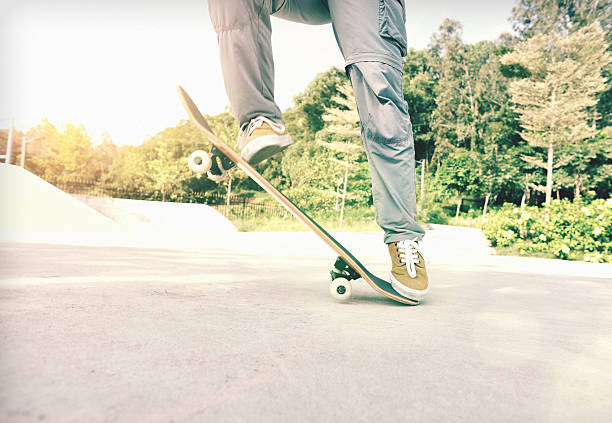 istock skateboarding woman jumping 522543455