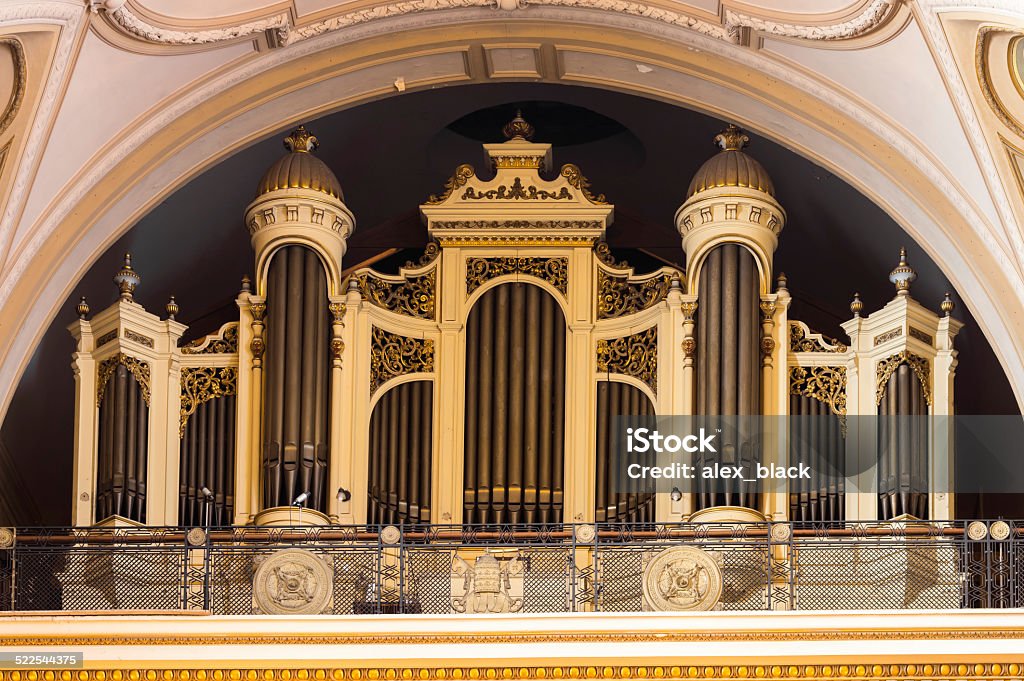 Pipe organ inside catholic church Church Stock Photo