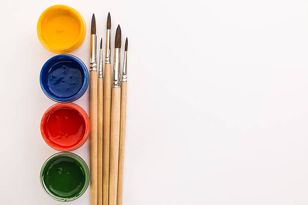 istock gouache and brushes on a white background 522545640
