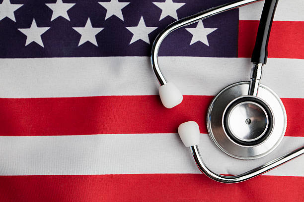 istock Stethoscope on an american stars and stripes flag 522546224