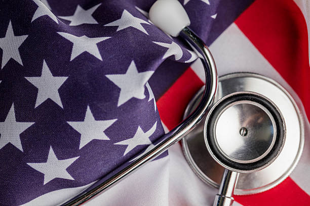 istock Stethoscope on an american stars and stripes flag 522546754